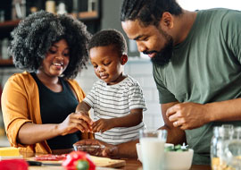 a family cooking together